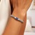 Weave Motif Bracelet with Blue Sapphire Accents in Sterling Silver (7.00 mm)