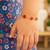 14k Yellow Gold 5 1/2 inch Childrens Bracelet with Enameled Strawberries (1.00 mm)