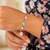 Sterling Silver 7 1/4 inch Bracelet with Crosses and Religious Medal Charms