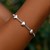 Sterling Silver Rhodium Plated Puffed Triple Heart Bracelet