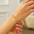14k Tri-Color Gold Textured Bead Station Lariat Bracelet (5.00 mm)