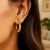 Textured Graduated Twist Hoop Earrings in 10k Yellow Gold