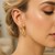 X Knot Style Round Hoop Earrings in 10k Yellow Gold