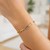 14k Yellow Gold 7 1/2 inch Paperclip Chain Bracelet with Three Diamond Links (2.00 mm)