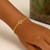 14k Yellow Gold 7 inch Curb Chain Bracelet with Heart (3.40 mm)