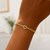14k Yellow Gold 7 inch Curb Chain Bracelet with Heart (3.40 mm)