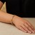 Fancy Satin Heart Line Bracelet in 14k Tri-Color Gold (6.35 mm)