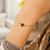 14K Yellow Gold Garnet Heart Bracelet