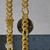 14k Yellow Gold High Polish Modern Lite Figaro Chain (9.50 mm)