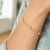 Puffed Heart Station Rolo Chain Bracelet in 14k Yellow Gold (3.30 mm)