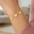 Sterling Silver Yellow Gold Plated Hearts Station Bracelet