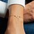 Adjustable Horseshoe Draw String Bracelet in 14K Yellow Gold