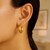 Fancy Twist Hoop Earrings in 14k Yellow Gold