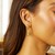 Textured Graduated Oval Hoop Earrings in 14k Yellow Gold