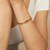 14K Yellow Gold Charm Lock Paperclip Chain Bracelet