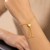 14k Yellow Gold Adjustable Lariat Style Heart Motif Bracelet (1.00 mm)