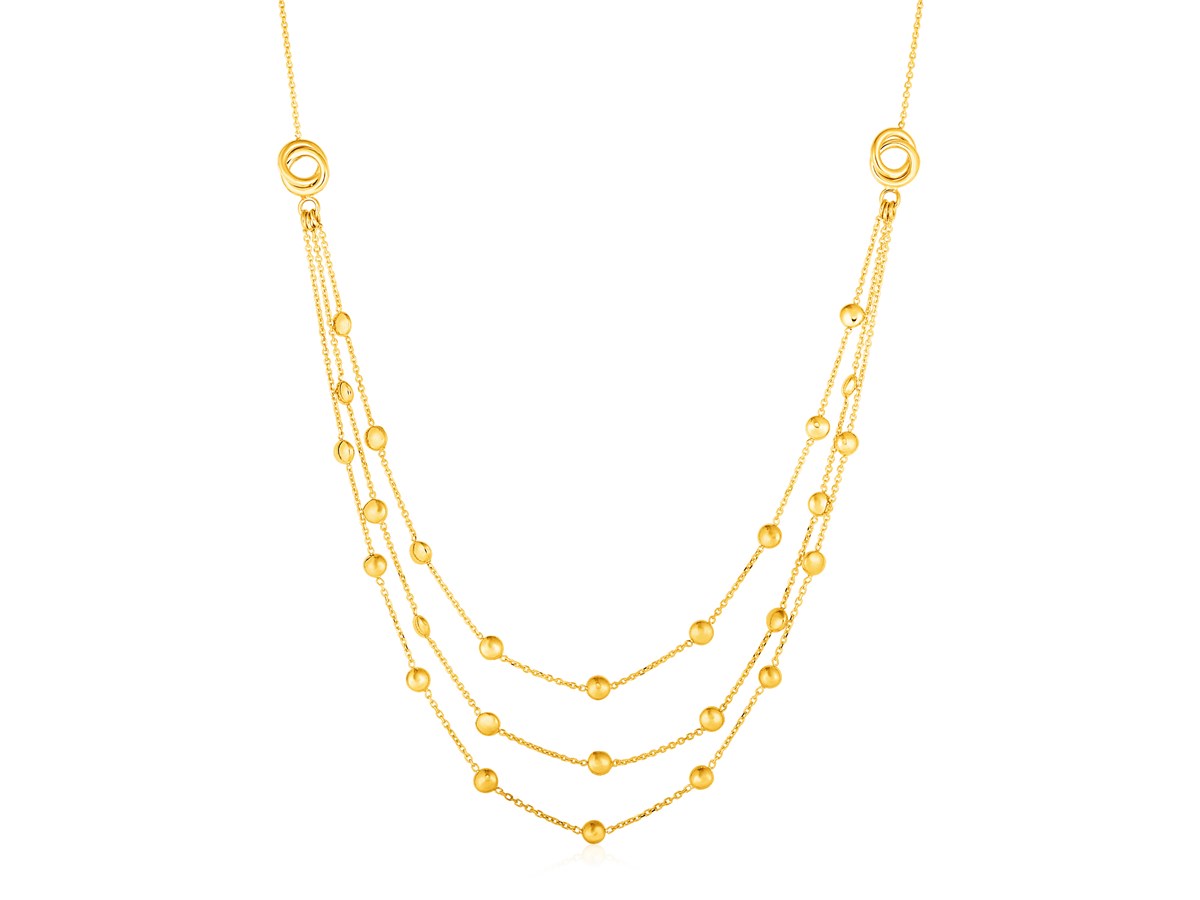 Station Necklace with Three Chains and Love Knots in 14k Yellow Gold